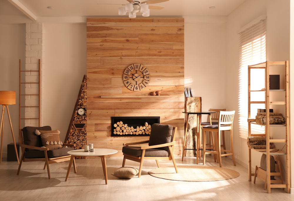 Decorative,fireplace,with,stacked,wood,in,cozy,living,room,interior