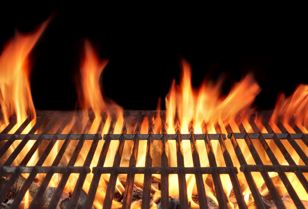 What Is the Difference Between Grilling Wood and Smoking Wood for Outdoor Cooking?